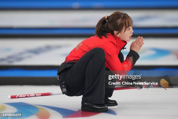 Jiang Xindi of Team China competes against Team Great Britain during the Women's Round Robin Session on Day 12 of the Beijing 2022 Winter Olympic...