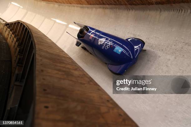 Mica McNeill of Team Great Britain slides during the 2-woman Bobsleigh training heats on day 12 of Beijing 2022 Winter Olympic Games at National...