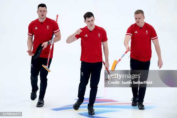 Hammy McMillan, Grant Hardie and Bobby Lammie of Team Great Britain compete against Team ROC during the Men's Round Robin Session on Day 12 of the...