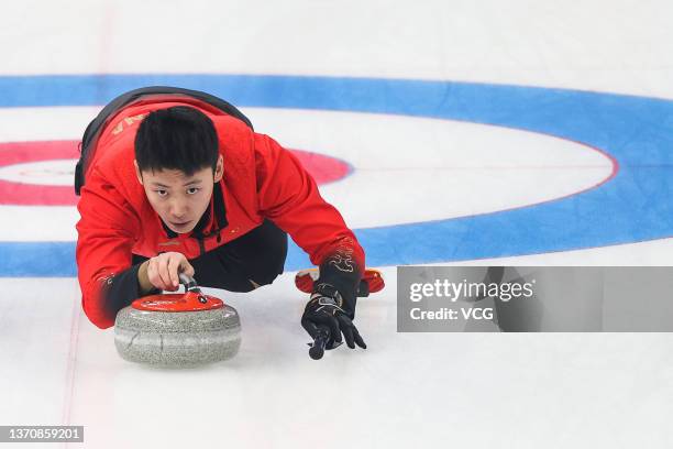 Ma Xiuyue of Team China competes against Team Switzerland during the Men's Round Robin Session on Day 12 of the Beijing 2022 Winter Olympic Games at...
