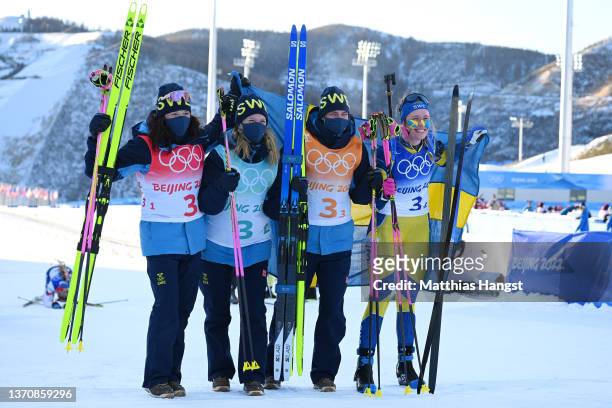 Gold medallists Linn Persson, Mona Brorsson, Hanna Oeberg and Elvira Oeberg of Team Sweden pose during Women's Biathlon 4x6km Relay on day 12 of 2022...