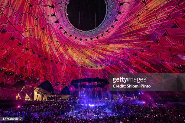 Will Champion, Chris Martin, Jonny Buckland and Guy Berryman of Coldplay perform live on stage at Al Wasl Plaza on February 15, 2022 in Dubai, United...