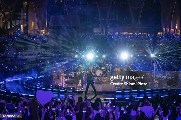 Will Champion, Chris Martin, Jonny Buckland and Guy Berryman of Coldplay perform live on stage at Al Wasl Plaza on February 15, 2022 in Dubai, United...