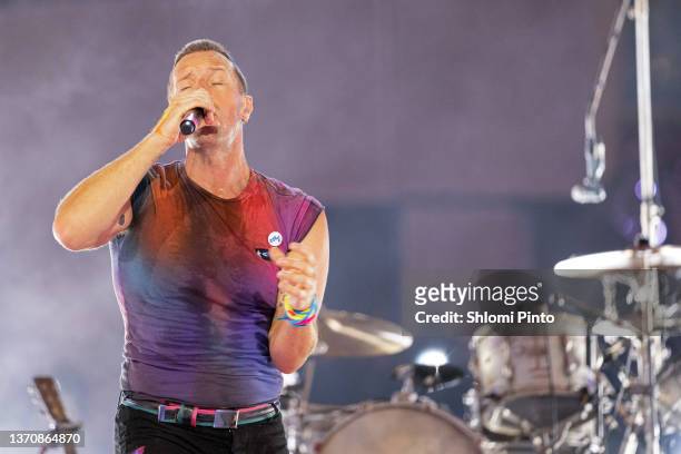 Chris Martin of Coldplay performs live on stage at Al Wasl Plaza on February 15, 2022 in Dubai, United Arab Emirates.