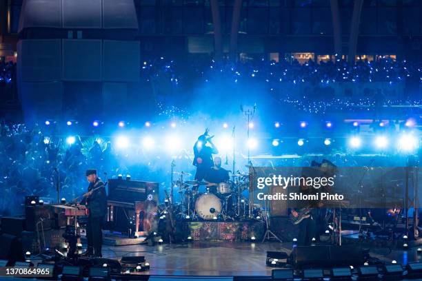 Will Champion, Chris Martin, Jonny Buckland and Guy Berryman of Coldplay perform live on stage at Al Wasl Plaza on February 15, 2022 in Dubai, United...