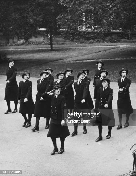 Parade of Women's Royal Naval Service personnel demonstrate the salute march past on 1st September 1941 at Westfield College in Hampstead, London,...