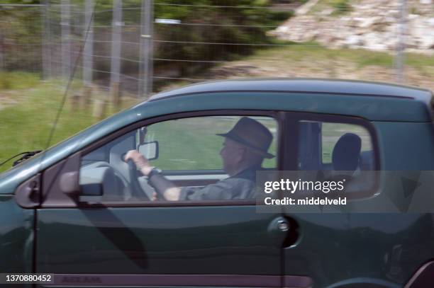 senior man driving car - on the move icon stock pictures, royalty-free photos & images