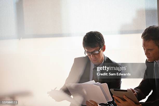 businessmen working together - business meeting serious stock pictures, royalty-free photos & images