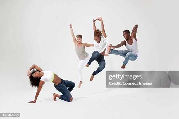 young woman under attack from rivals - best male dancer stock pictures, royalty-free photos & images