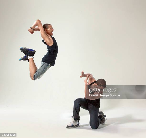 young man defending himself against rival - tyranny stockfoto's en -beelden