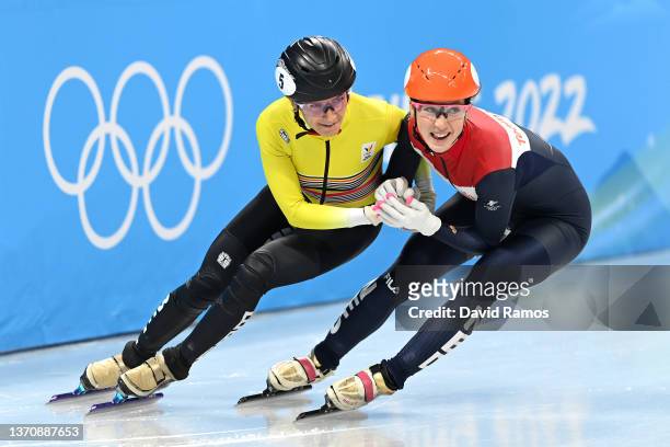 Hanne Desmet of Team Belgium and Suzanne Schulting of Team Netherlands react after skating during the Women's 1500m Semifinals on day twelve of the...