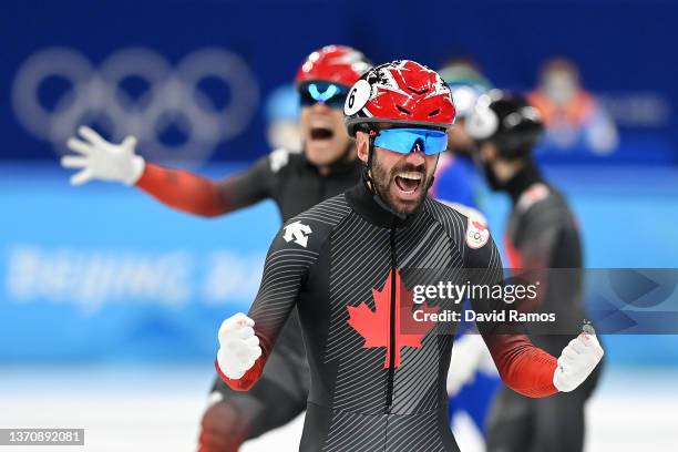 Charles Hamelin of Team Canada celebrates winning the Gold medal during the Men's 5000m Relay Final A on day twelve of the Beijing 2022 Winter...