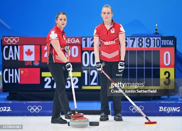 Jocelyn Peterman and Dawn McEwen of Team Canada compete against Team China during the Women's Round Robin Session on Day 12 of the Beijing 2022...