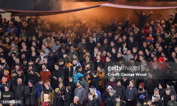 Hull City fans let off a smoke bomb inside the stadium during the Sky Bet Championship match between Sheffield United and Hull City at Bramall Lane...