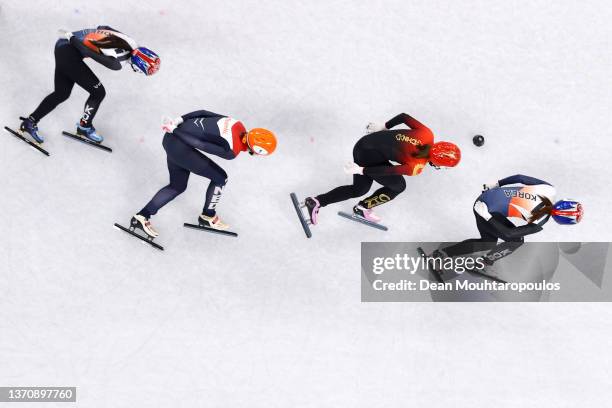 Yubin Lee of Team South Korea, Suzanne Schulting of Team Netherlands, Yutong Han of Team China and Minjeong Choi of Team South Korea skate during the...