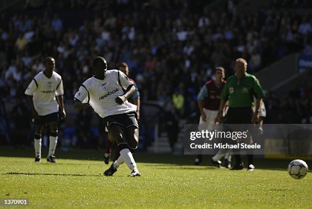 Michael Ricketts of Bolton Wanderers scores the winning goal from a penalty during the FA Barclaycard Premiership match between Bolton Wanderers and...