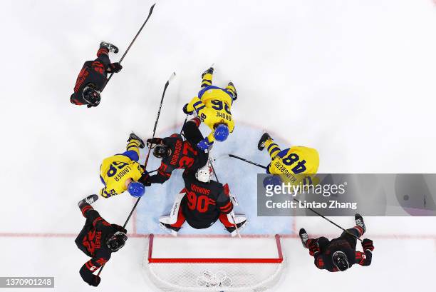 Matt Tomkins of Team Canada makes a save in the first period during the Men’s Ice Hockey Quarterfinal match between Team Sweden and Team Canada on...