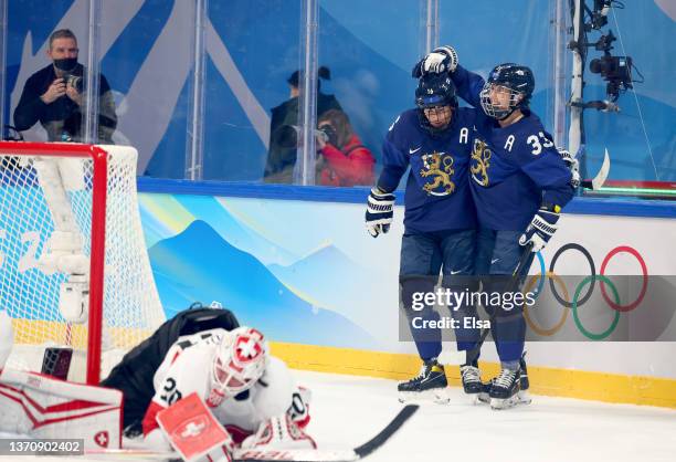 Petra Nieminen and Michelle Karvinen of Team Finland celebrate during the Women’s Ice Hockey Bronze medal match between Team Finland and Team...