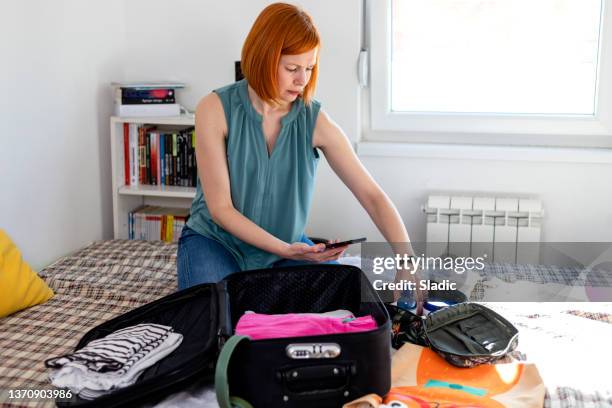 packing for a trip - break away from pack technology stock pictures, royalty-free photos & images