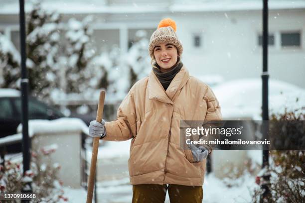 portrait of young woman on a snowy day - city of spades bildbanksfoton och bilder