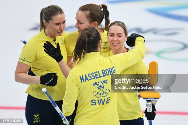Anna Hasselborg and Sofia Mabergs of Team Sweden celebrate their victory against Team ROC during the Women's Round Robin Session on Day 12 of the...