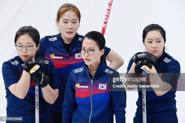 Kim Seon-Yeong, Kim Yeong-Mi, Kim Eun-Jung and Kim Kyeong-Ae of Team South Korea look on while competing against Team Denmark during the Women's...