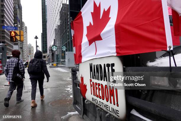 Truck participates in a blockade of downtown streets near the parliament building as a demonstration led by truck drivers protesting vaccine mandates...