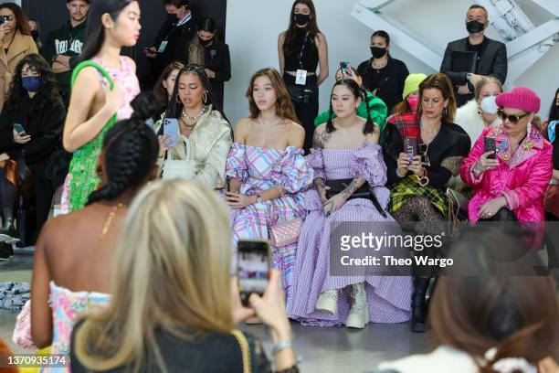 Asia Monet Ray, Mika Benabs and Michelle Zauner attend the Claudia Li fashion show during New York Fashion Week: The Shows on February 16, 2022 in...