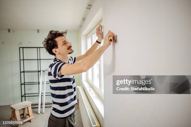 preparing for painting - cleaning walls stock pictures, royalty-free photos & images