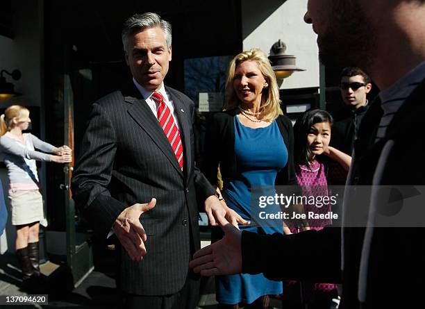 Republican presidential candidate, former Utah Gov. Jon Huntsman along with his wife, Mary Kaye Huntsman and daughter, Gracie Mei Huntsman, greet...