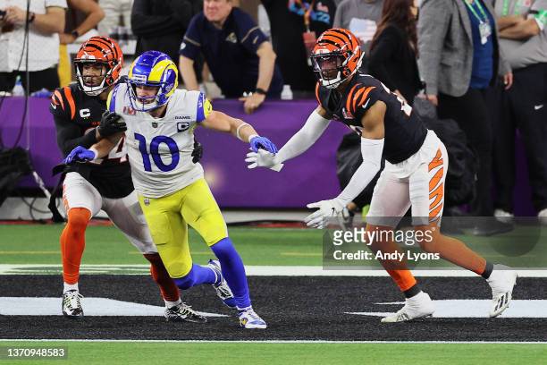 Cooper Kupp of the Los Angeles Rams is held back by Vonn Bell of the Cincinnati Bengals during Super Bowl LVI at SoFi Stadium on February 13, 2022 in...