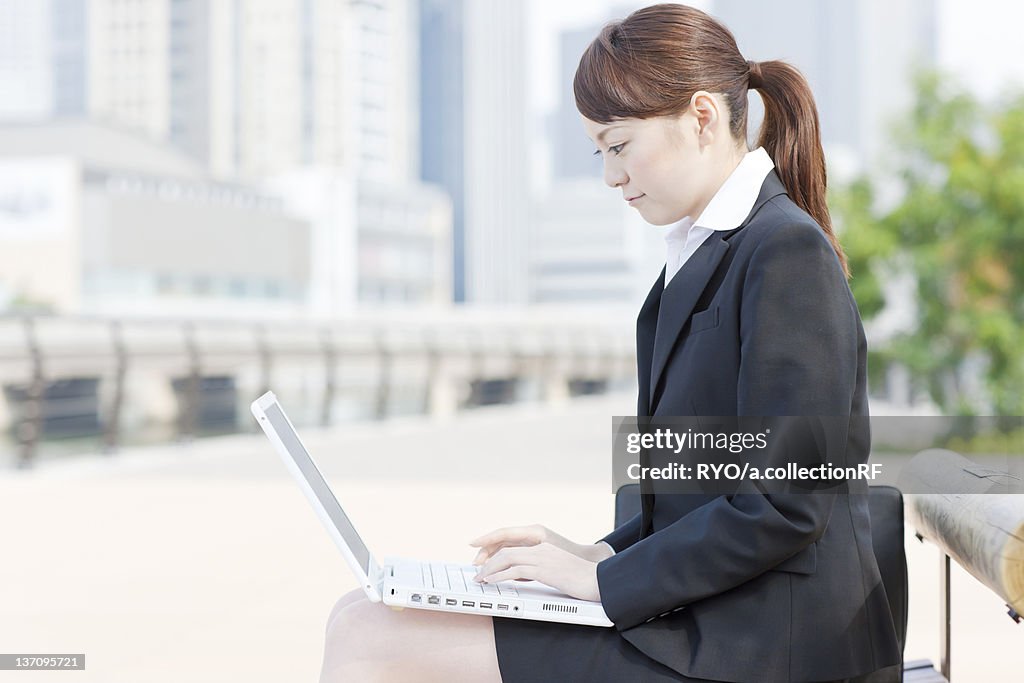 Businesswoman Using Laptop