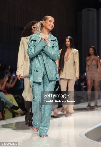 Molly-Mae Hague walks the runway for the PrettyLittleThing X Molly-Mae show at The Londoner Hotel on February 16, 2022 in London, England.