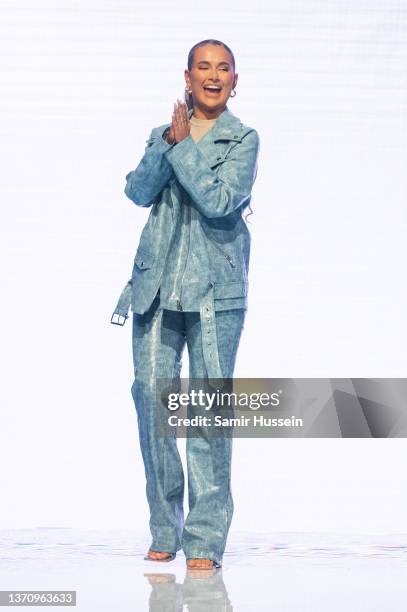 Molly Mae walks the catwalk during the PrettyLittleThing X Molly-Mae show at The Londoner Hotel on February 16, 2022 in London, England.