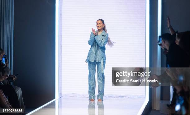 Molly Mae walks the catwalk during the PrettyLittleThing X Molly-Mae show at The Londoner Hotel on February 16, 2022 in London, England.