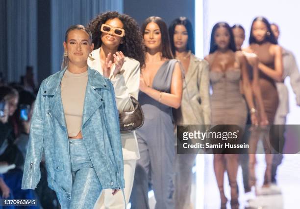 Molly Mae walks the catwalk during the PrettyLittleThing X Molly-Mae show at The Londoner Hotel on February 16, 2022 in London, England.