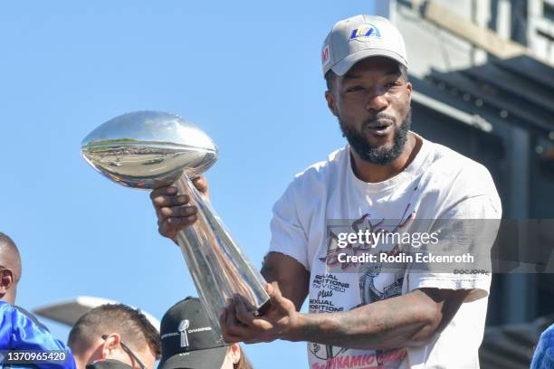 Leonard Floyd holds the Lombardi Trophy at the Los Angeles Rams Super Bowl LVI Victory Parade and Rally on February 16, 2022 in Los Angeles,...