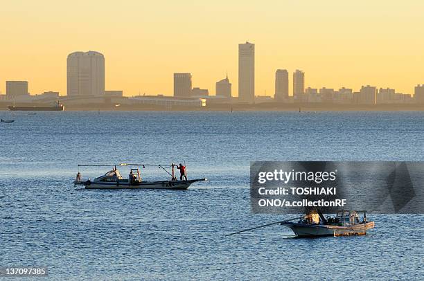 skyline of makuhari at dawn, chiba prefecture, japan - chiba city imagens e fotografias de stock