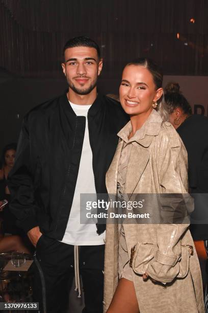 Tommy Fury and Molly-Mae Hague attend the PrettyLittleThing X Molly-Mae show at The Londoner Hotel on February 16, 2022 in London, England.