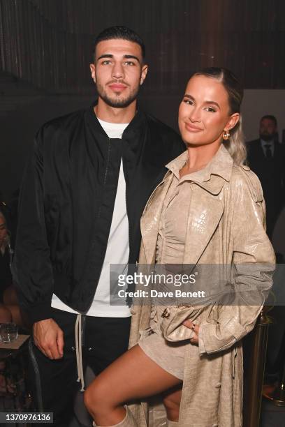 Tommy Fury and Molly-Mae Hague attend the PrettyLittleThing X Molly-Mae show at The Londoner Hotel on February 16, 2022 in London, England.