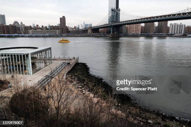 General view of Lower Manhattan across the East River from Brooklyn Bridge Park on February 16, 2022 in the Brooklyn borough of New York City. A...