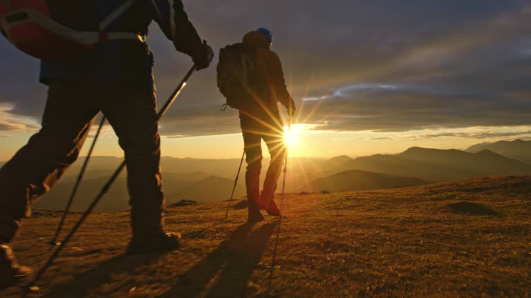 https://media.gettyimages.com/id/1370988722/video/aerial-a-group-of-people-hiking-on-the-mountain-top-at-sunset.jpg?b=1&s=640x640&k=20&c=gyKy8RcsFxNZl8sx2AvfiwWbcyCs-p1vLcOC3Oxc-4M=