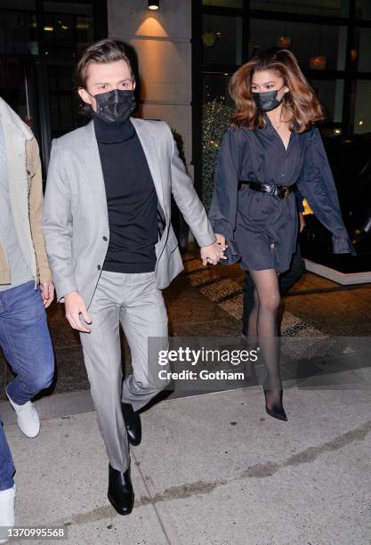 Tom Holland and Zendaya are seen departing their hotel on February 16, 2022 in New York City.