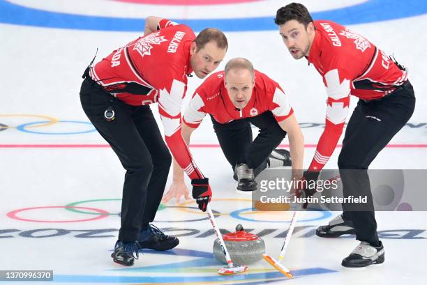 Geoff Walker, Mark Nichols and Brett Gallant of Team Canada compete against Team Great Britain during the Men’s Curling Round Robin Session on Day 13...