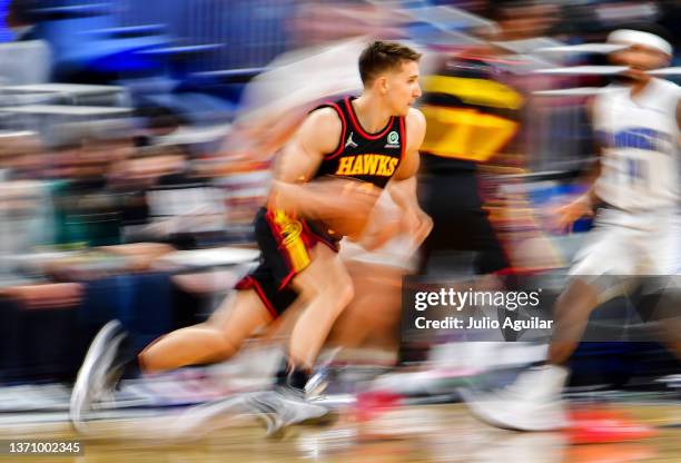 Bogdan Bogdanovic of the Atlanta Hawks drives to the net against the Orlando Magic in the second half at Amway Center on February 16, 2022 in...