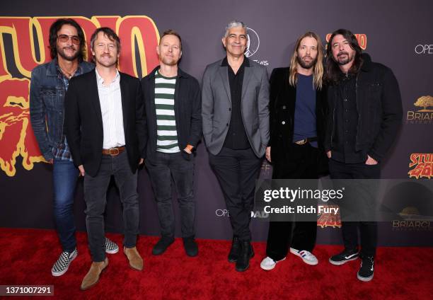 Rami Jaffee, Chris Shiflett, Nate Mendel, Pat Smear, Taylor Hawkins, and Dave Grohl of Foo Fighters attend the Los Angeles premiere of "Studio 666"...