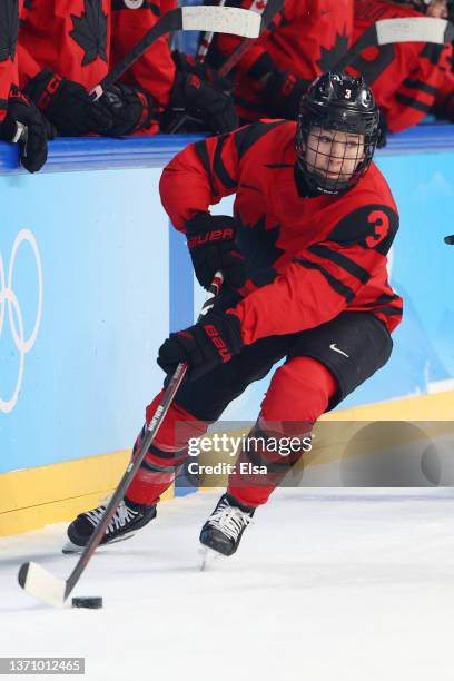Jocelyne Larocque of Team Canada skates with the puck in the first period during the Women's Ice Hockey Gold Medal match between Team Canada and Team...
