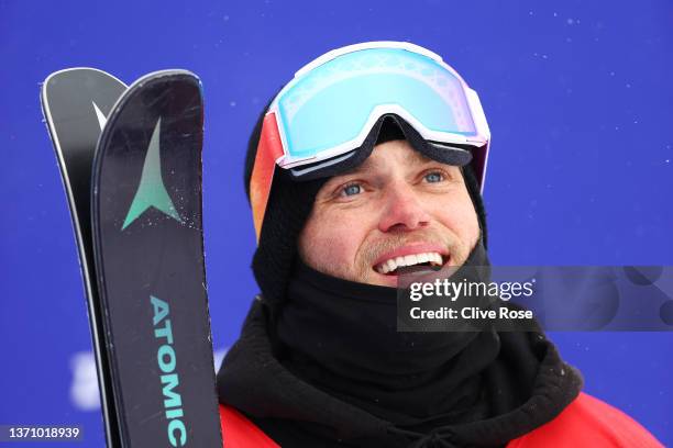 Gus Kenworthy of Team Great Britain reacts after their second run during the Men's Freestyle Skiing Freeski Halfpipe Qualification on Day 13 of the...