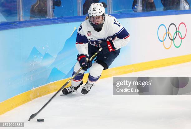 Grace Zumwinkle of Team United States stickhandles the puck in the third period during the Women's Ice Hockey Gold Medal match between Team Canada...