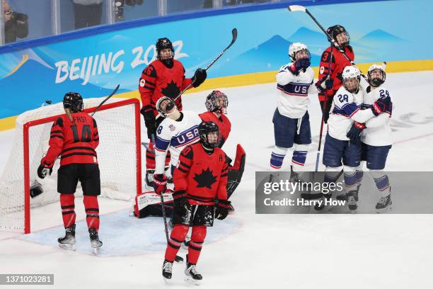 Amanda Kessel of Team United States celebrates with teammates after scoring a goal in the third period during the Women's Ice Hockey Gold Medal match...